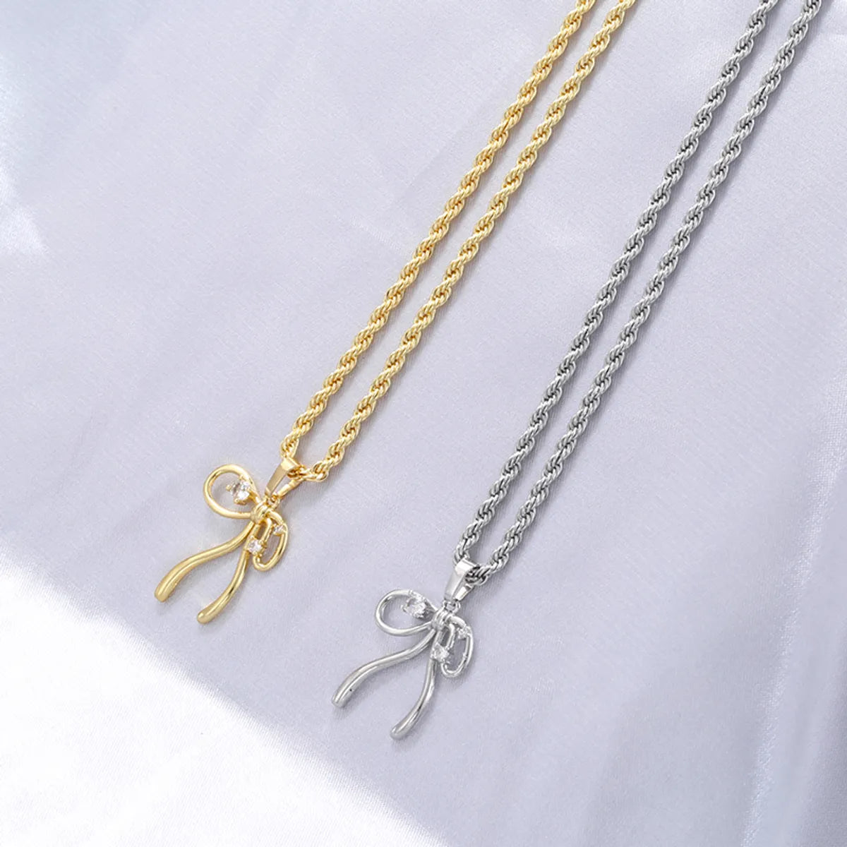 Luxury Diamond Necklaces-Copper 18K Gold Plated Casual Bow Knot Inlay Zircon Pendant Necklace